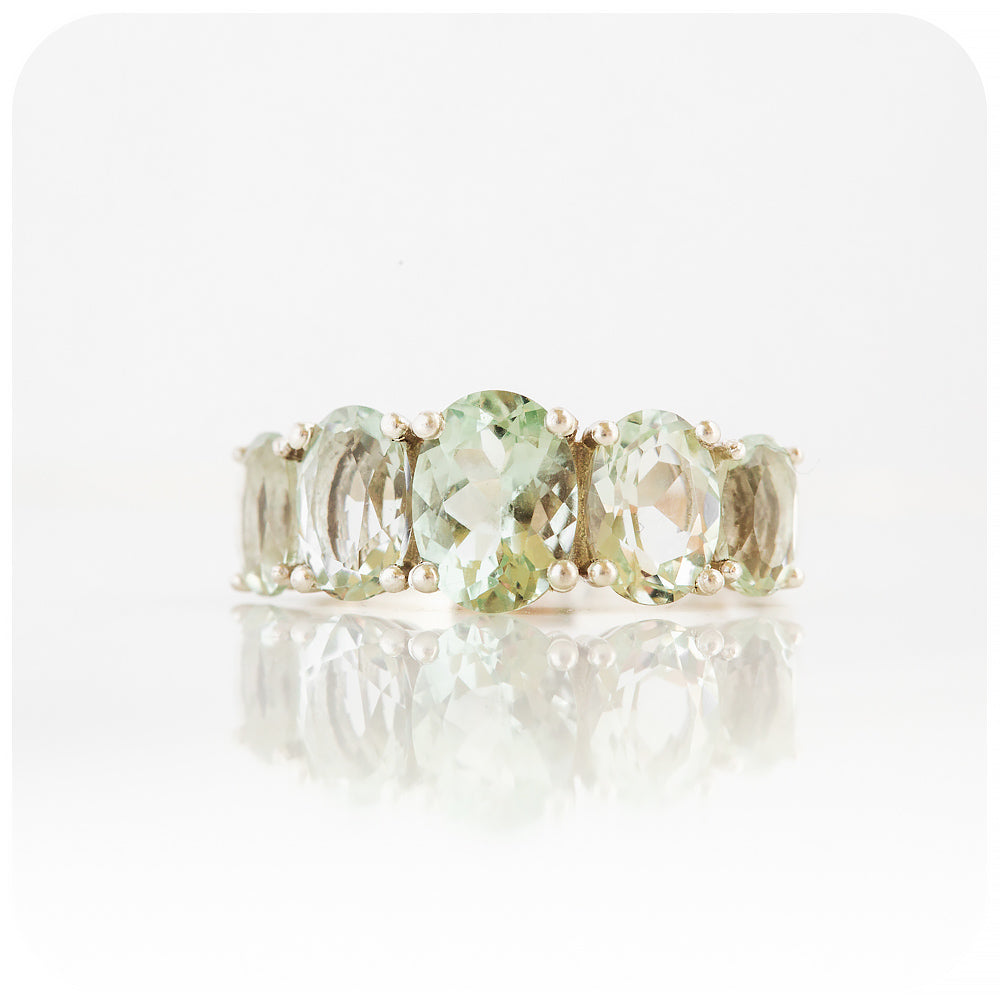 oval cut minty green prasiolite half eternity anniversary ring