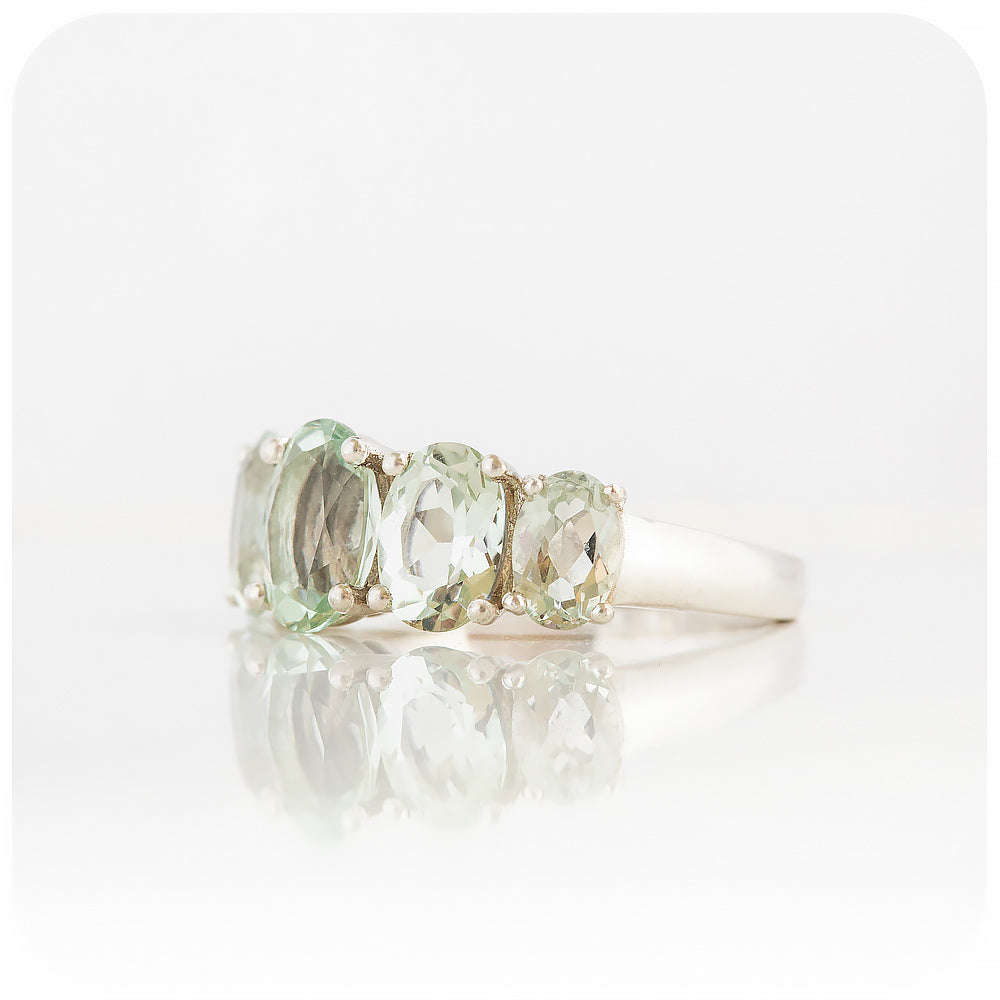 oval cut minty green prasiolite half eternity anniversary ring