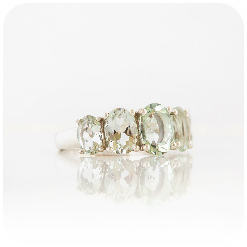 oval cut minty green prasiolite half eternity anniversary ring