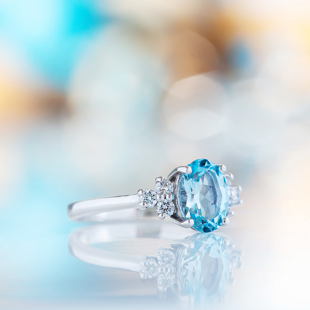 Este, an Oval cut Sky Blue Topaz and Lab Diamond Ring - Victoria's Jewellery