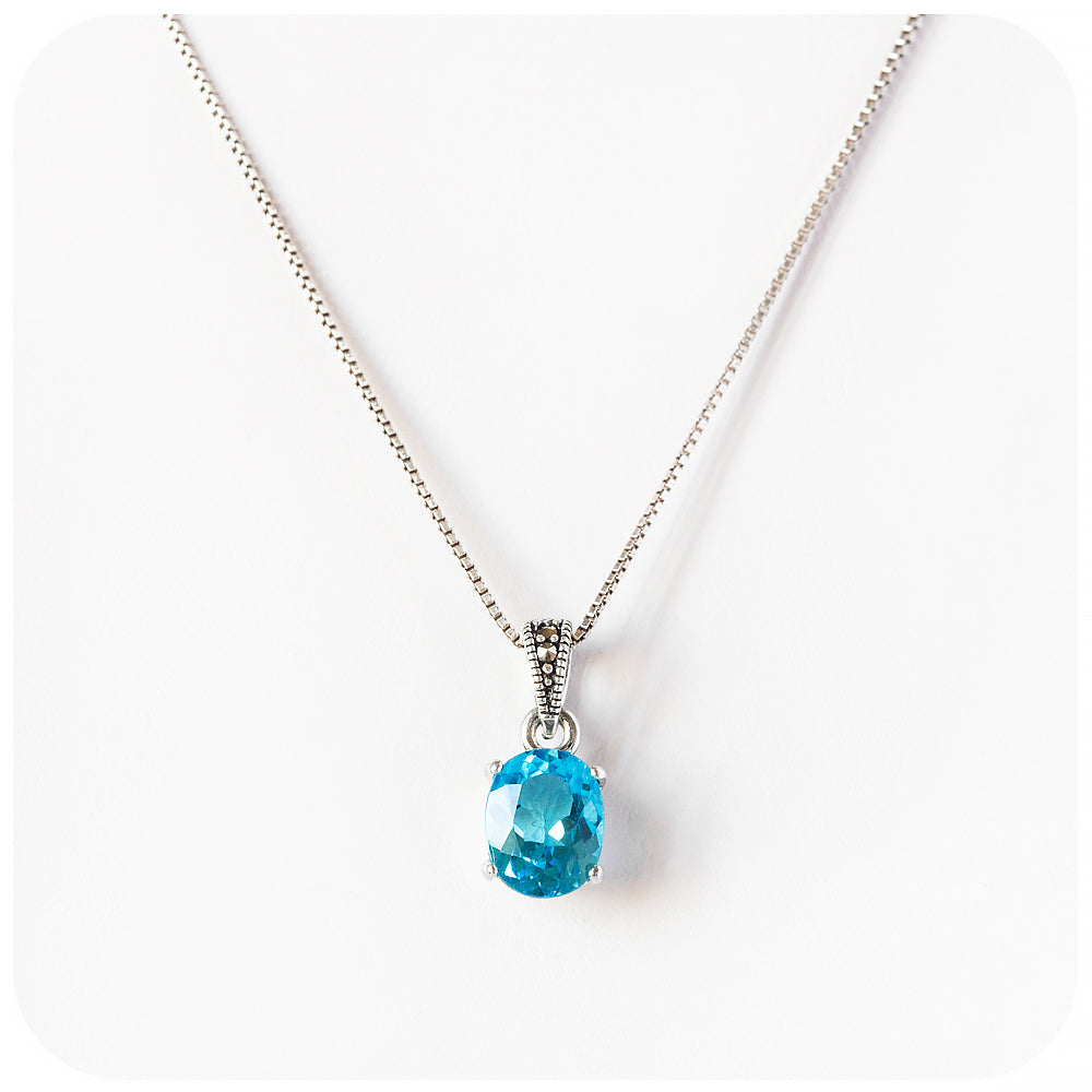 Oval cut Swiss Blue Topaz Pendant