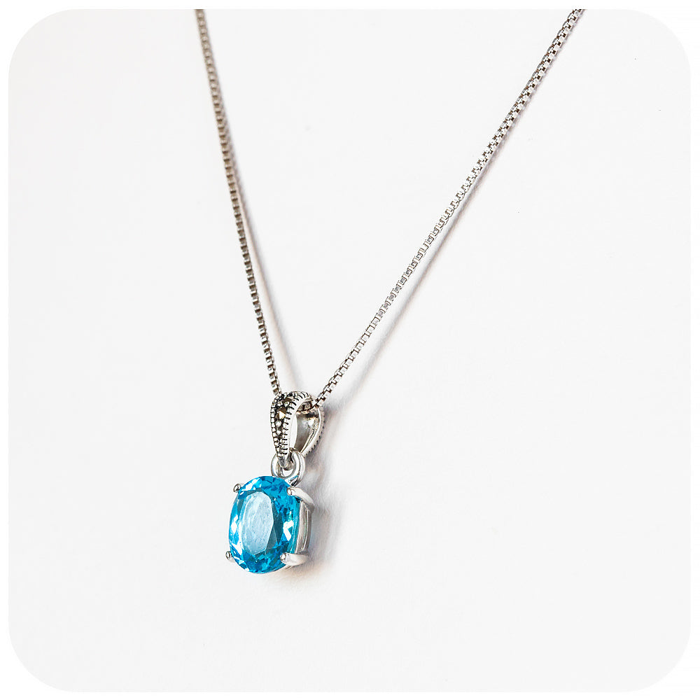 Oval cut Swiss Blue Topaz Pendant