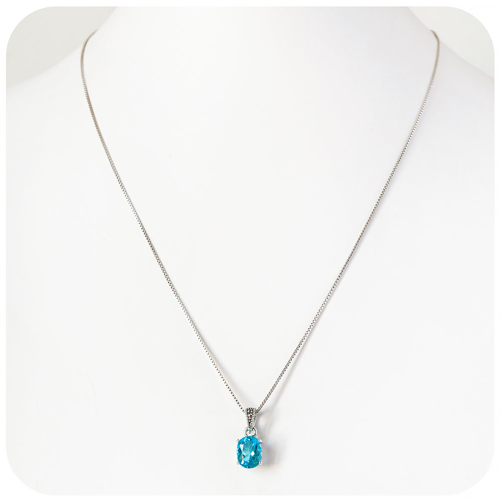 Oval cut Swiss Blue Topaz Pendant
