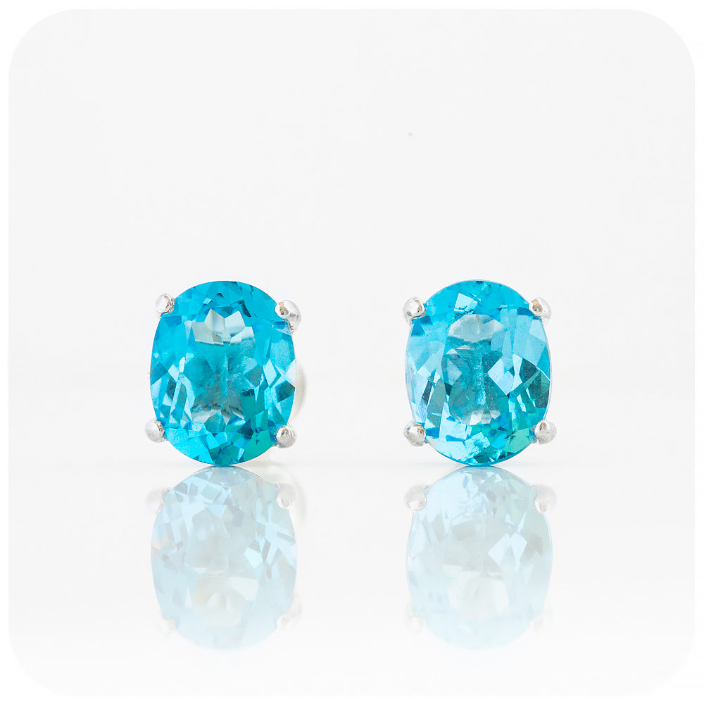 Oval cut Swiss Blue Topaz Stud Earring