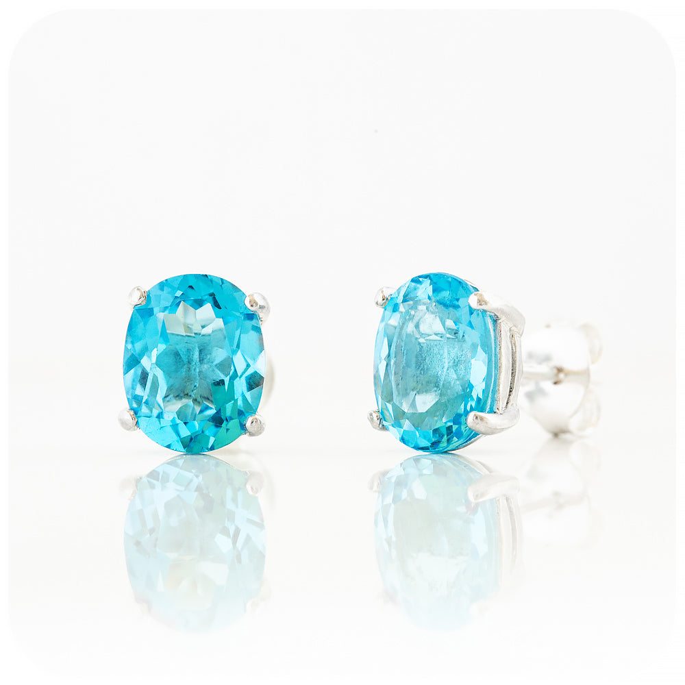 Oval cut Swiss Blue Topaz Stud Earring