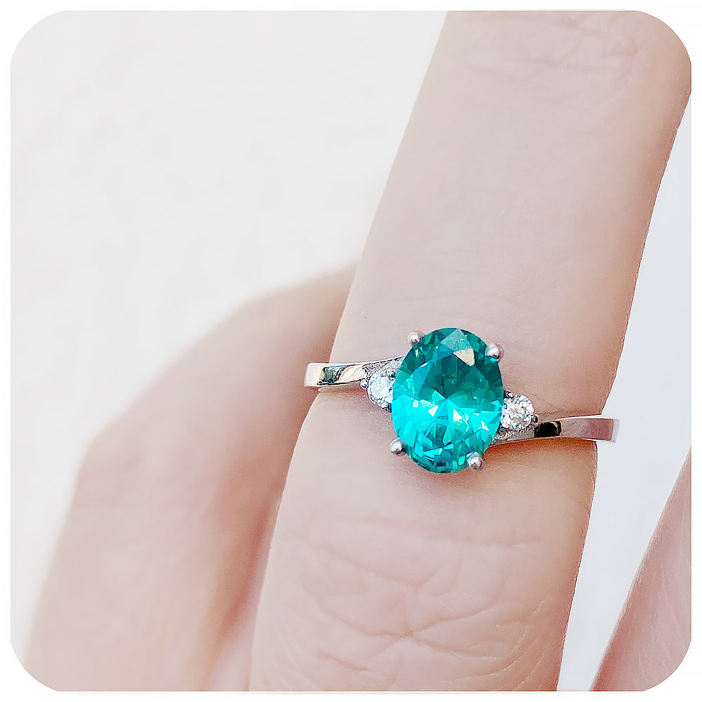Oval cut Blue-Green Teal Lab Grown Sapphire and Moissanite Engagement Ring - Victoria's Jewellery