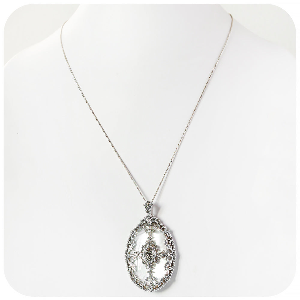 Oval Mother of Pearl and Marcasite Pendant in Sterling Silver