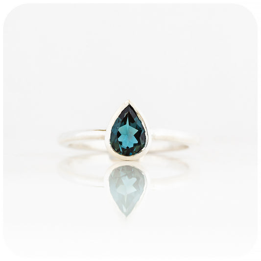 Linda, Pear cut London Blue Topaz Ring