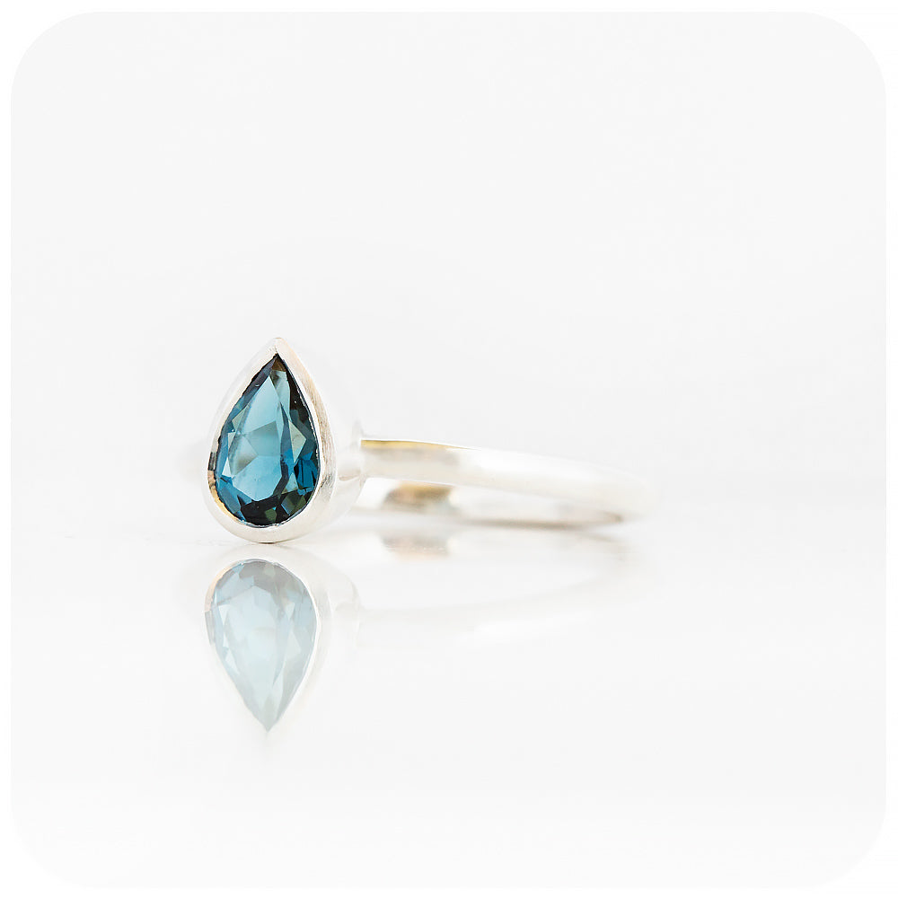 Linda, Pear cut London Blue Topaz Ring