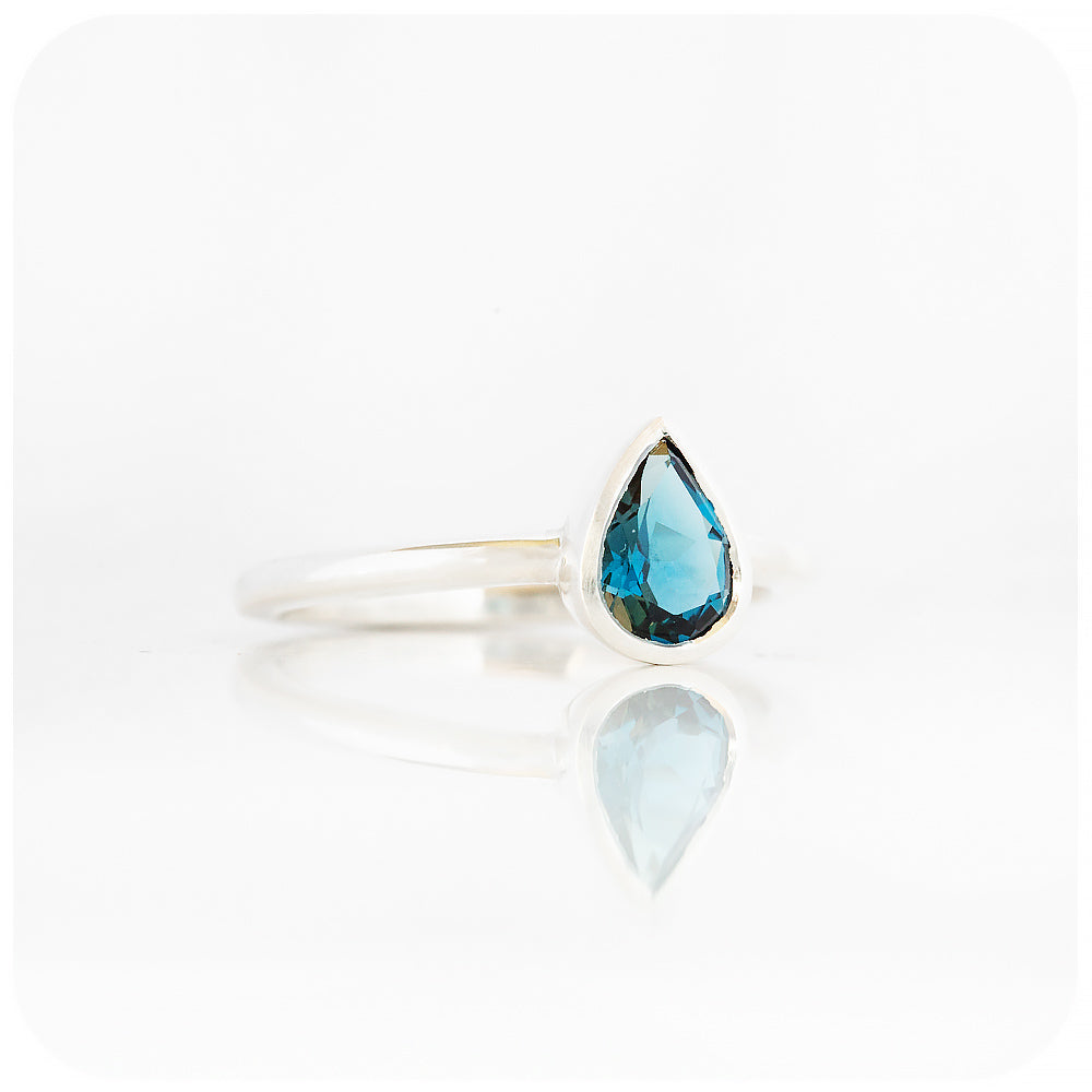 Linda, Pear cut London Blue Topaz Ring