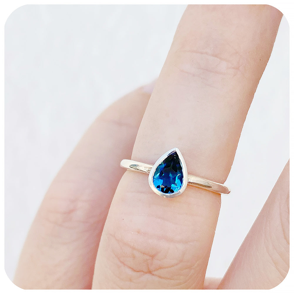 Linda, Pear cut London Blue Topaz Ring