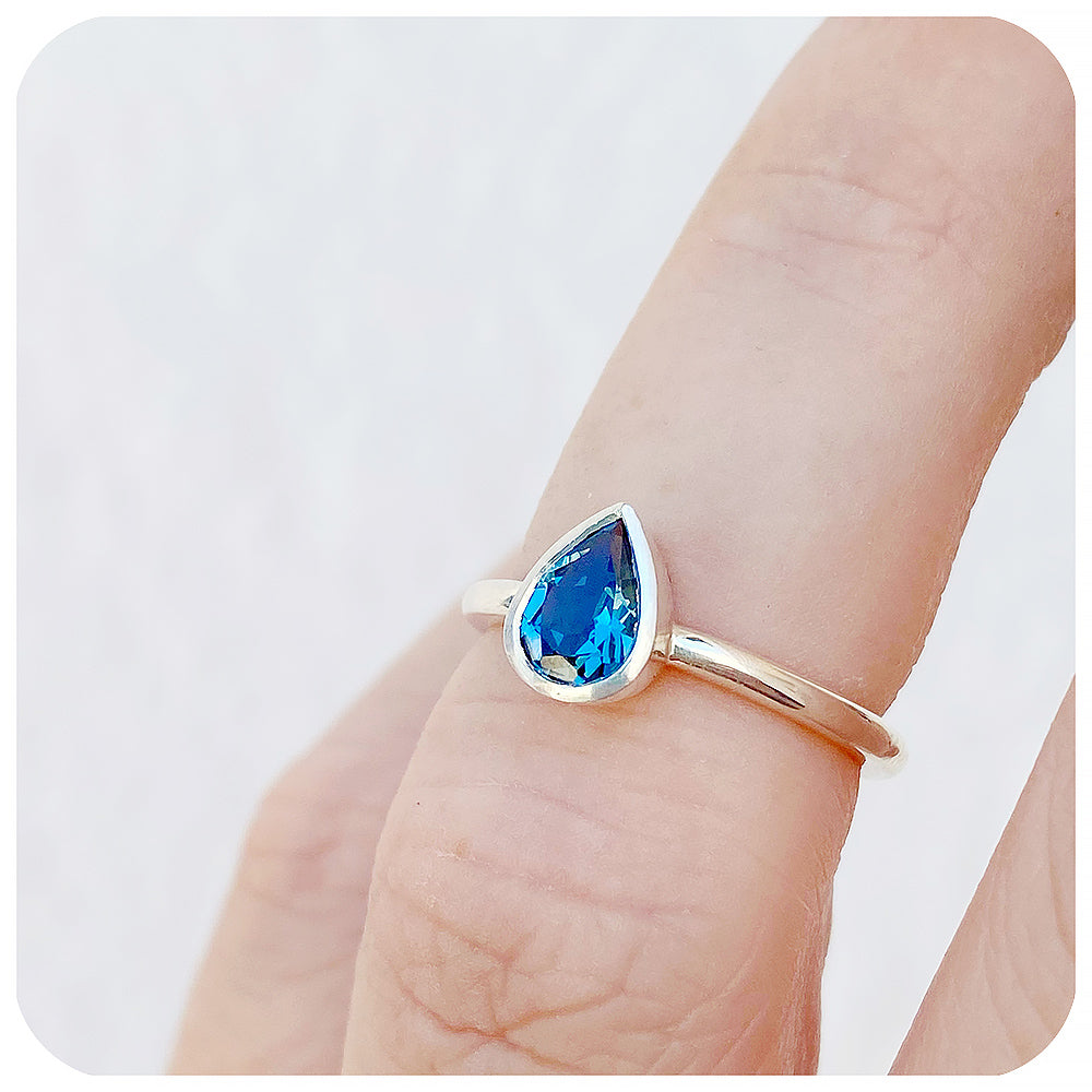Linda, Pear cut London Blue Topaz Ring