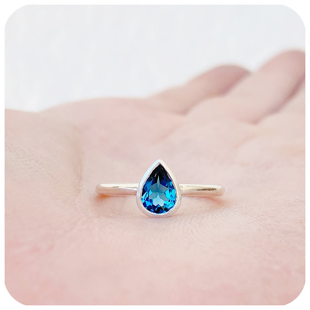 Linda, Pear cut London Blue Topaz Ring