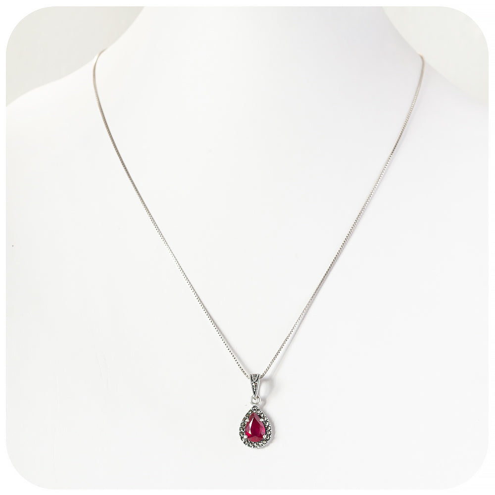 Pear cut Ruby Halo Pendant in Sterling Silver