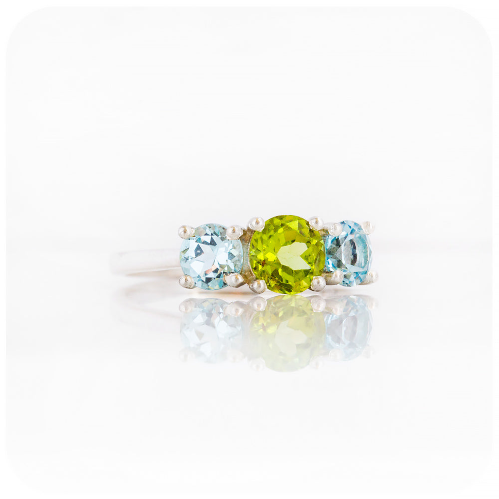 Round cut Trilogy Anniversary ring with Peridot and Sky Blue Topaz - Victoria's Jewellery