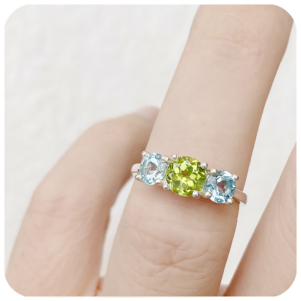 Round cut Trilogy Anniversary ring with Peridot and Sky Blue Topaz - Victoria's Jewellery