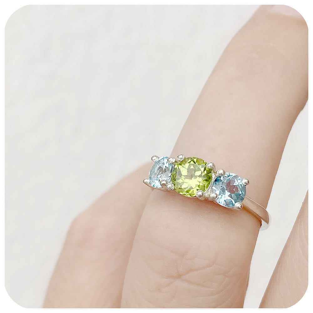 Round cut Trilogy Anniversary ring with Peridot and Sky Blue Topaz - Victoria's Jewellery