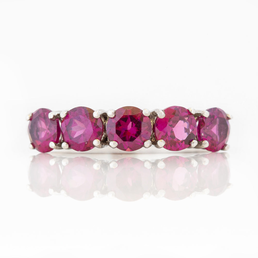 Annie, a Rhodolite Half Eternity Ring