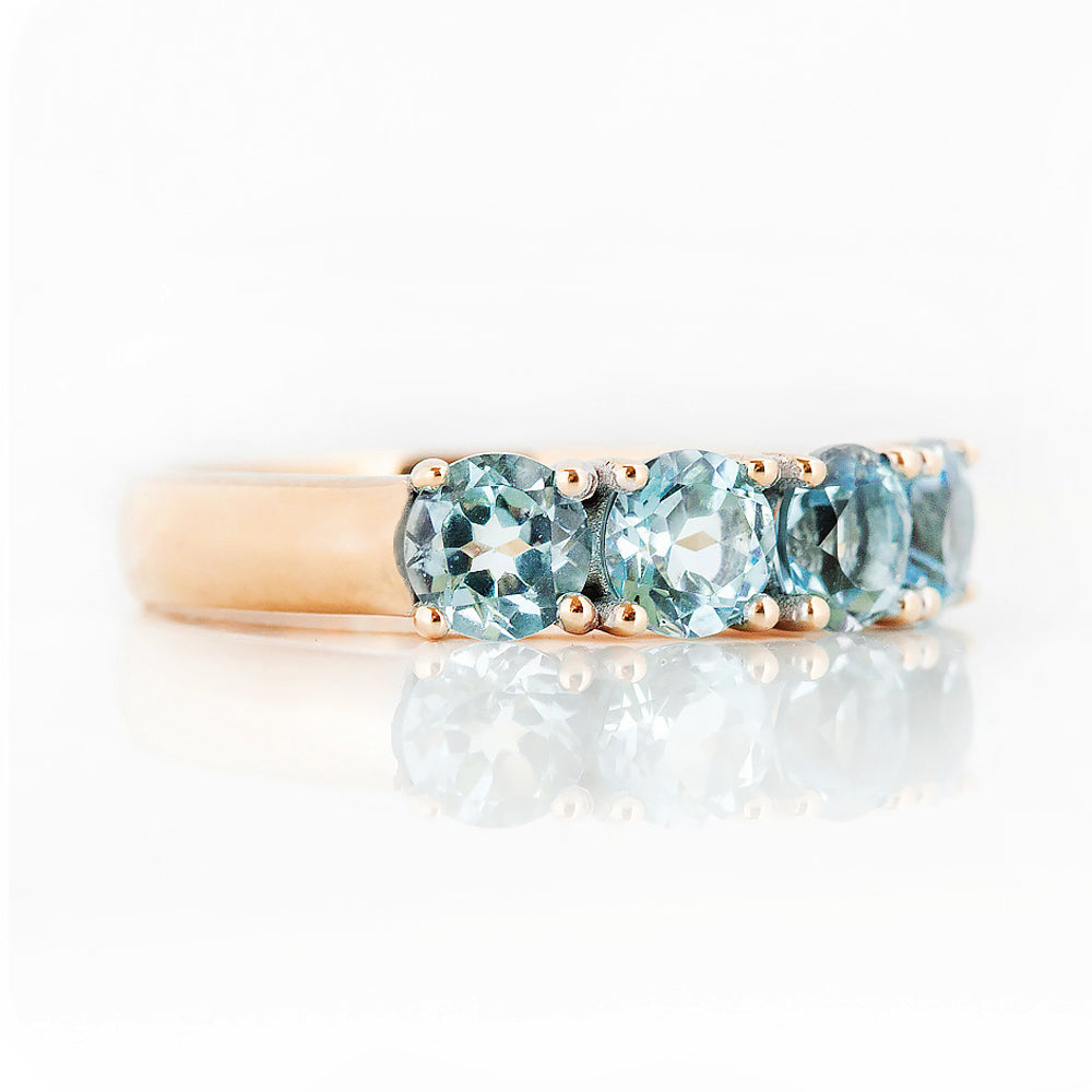 Round cut Aquamarine Half Eternity Ring in Rose Gold - Victoria's Jewellery