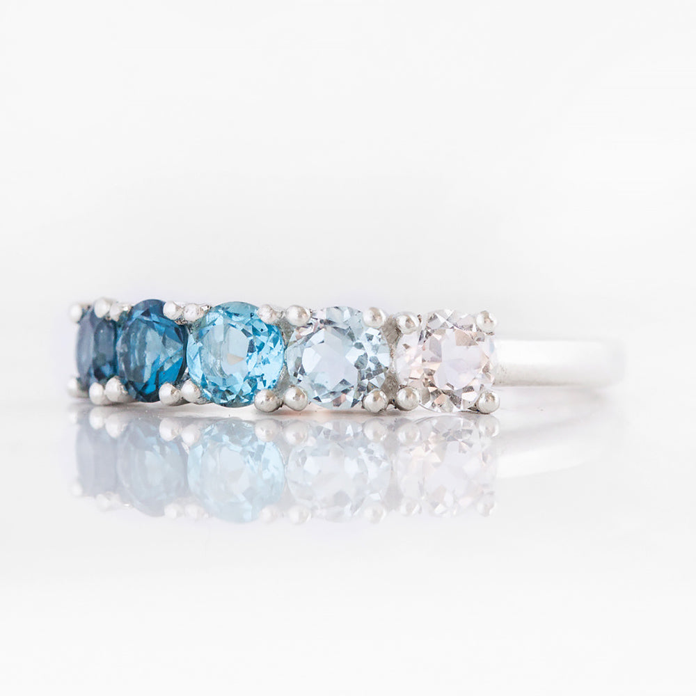 Round cut Blue Topaz Rainbow Half Eternity Ring - Victoria's Jewellery