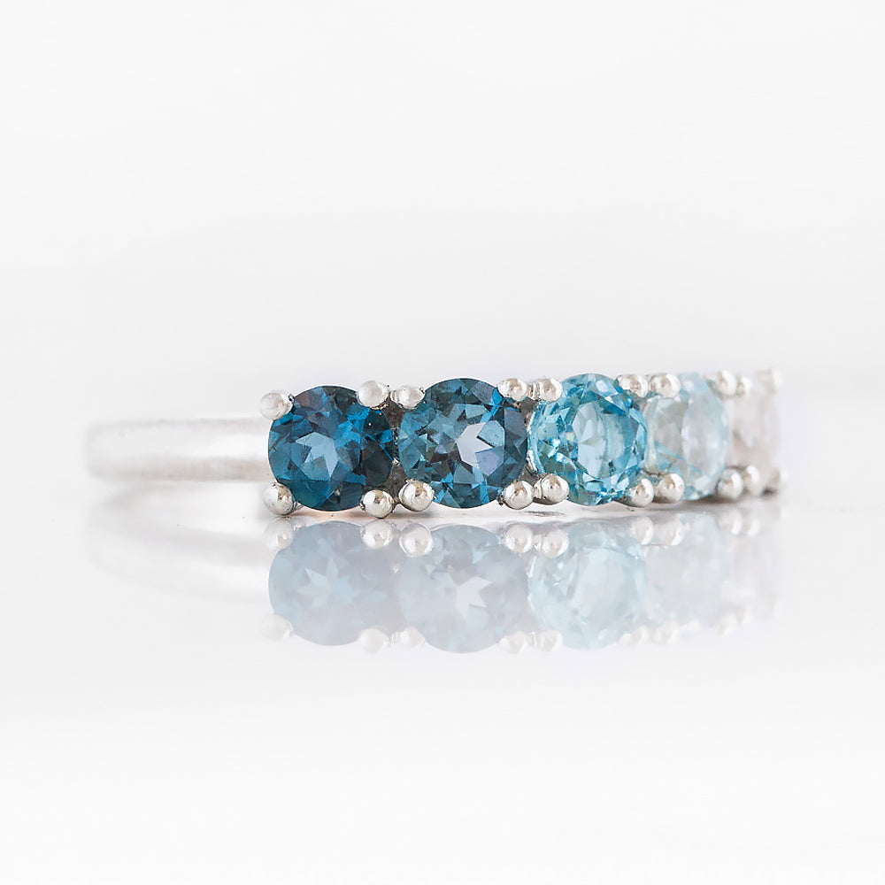 Round cut Blue Topaz Rainbow Half Eternity Ring - Victoria's Jewellery