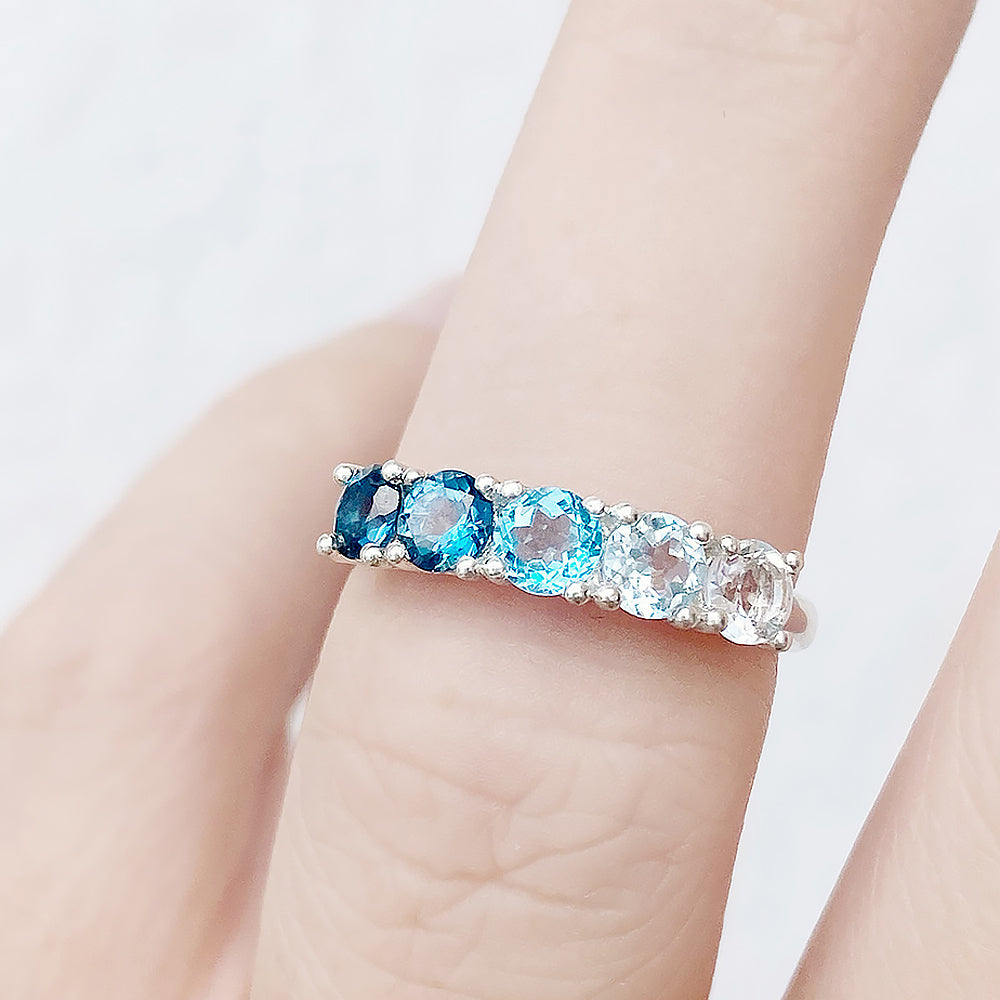 Round cut Blue Topaz Rainbow Half Eternity Ring - Victoria's Jewellery