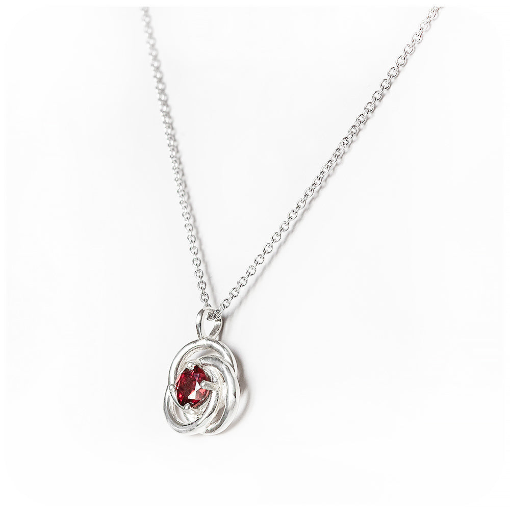 Freyja, a round cut Garnet Pendant