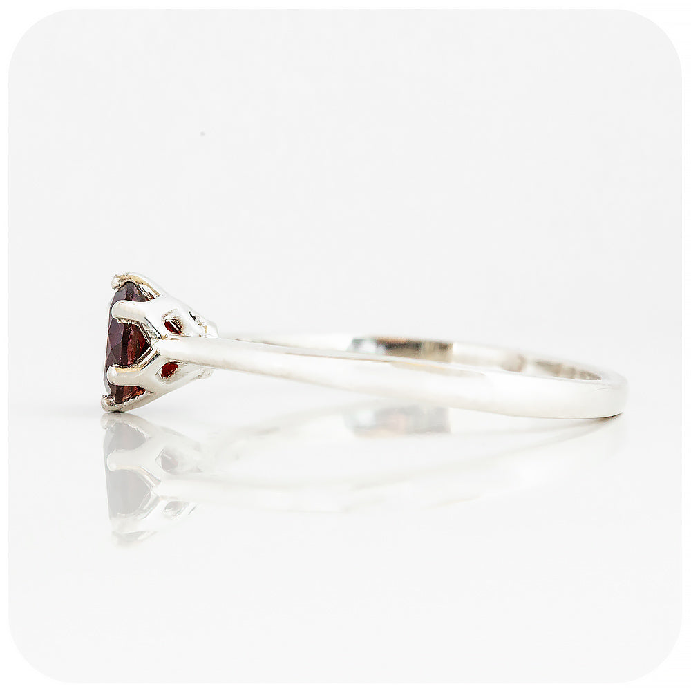 Tulip, a Six Claw Garnet Ring