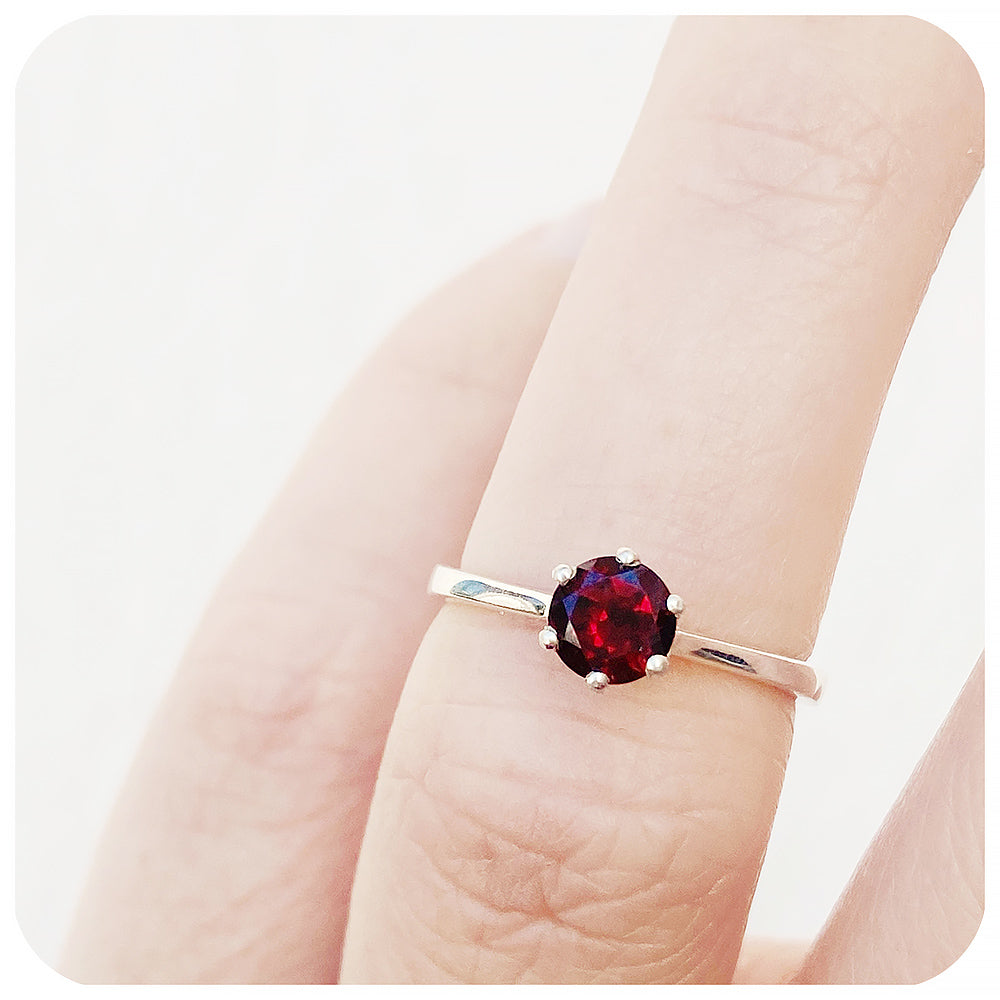 Tulip, a Six Claw Garnet Ring