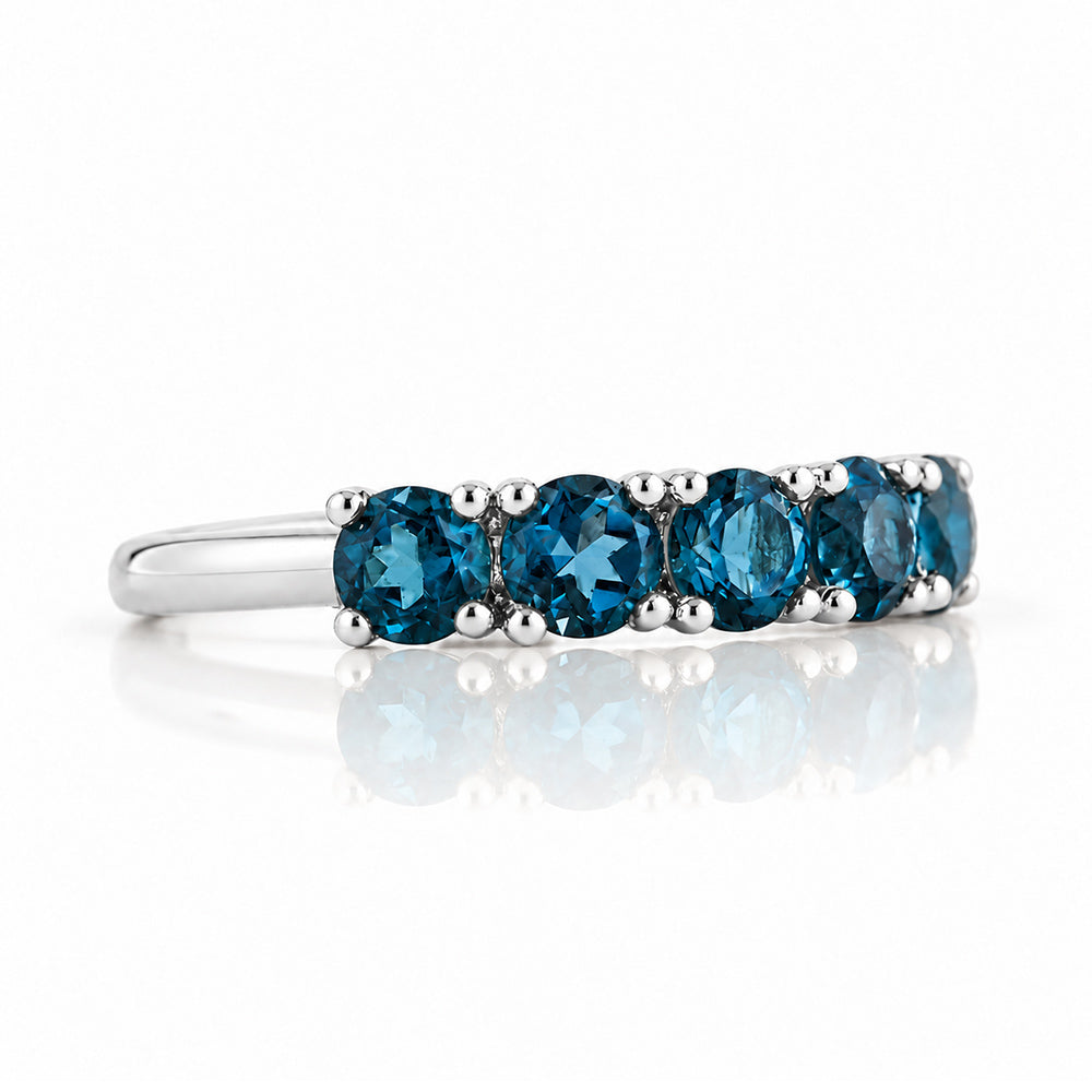 Annie, a London Blue Topaz Half Eternity Ring - Victoria's Jewellery