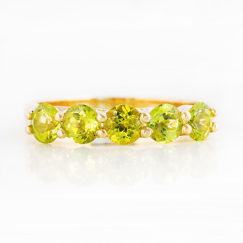 Danelle, a Peridot Half Eternity Trellis Ring