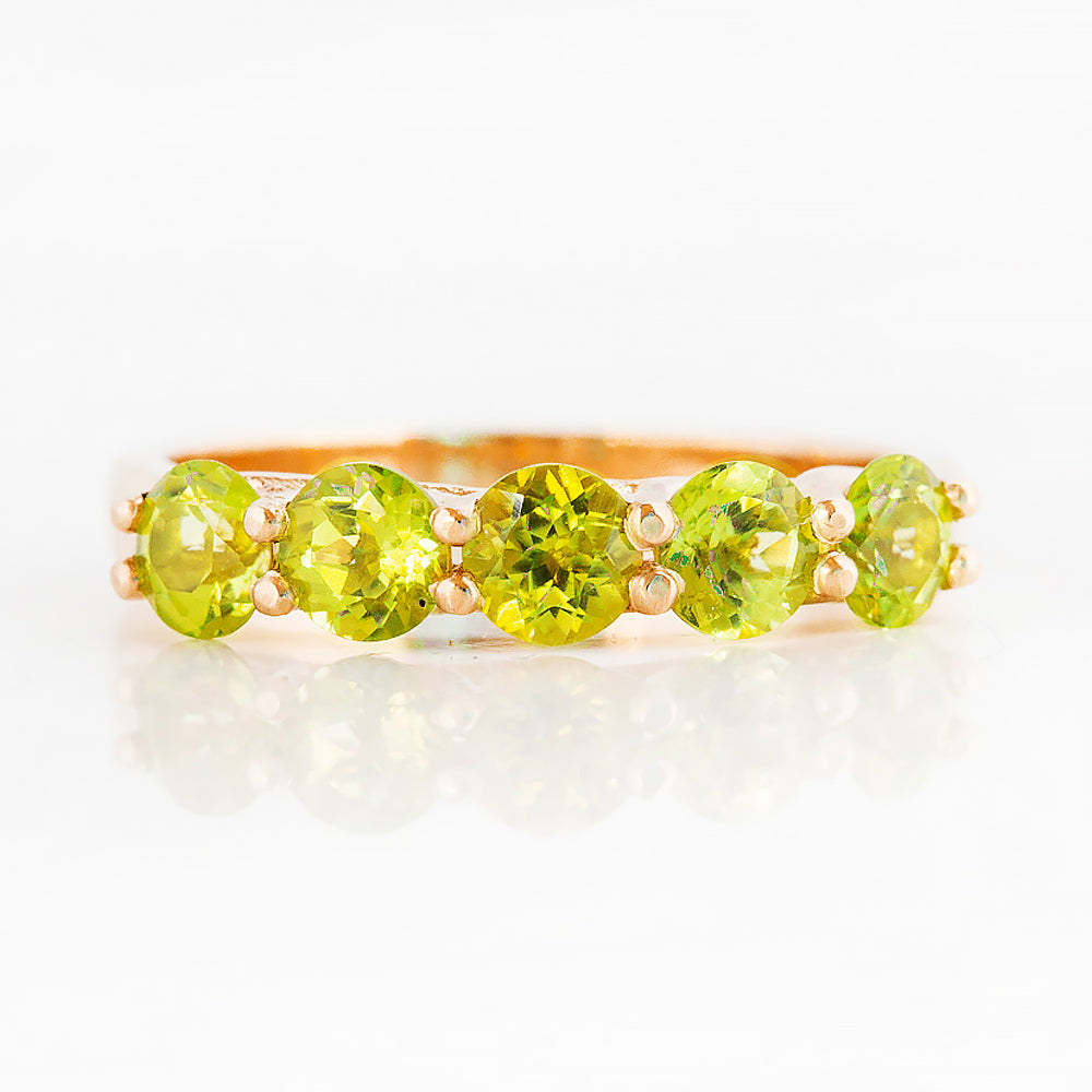 Danelle, a Peridot Half Eternity Trellis Ring