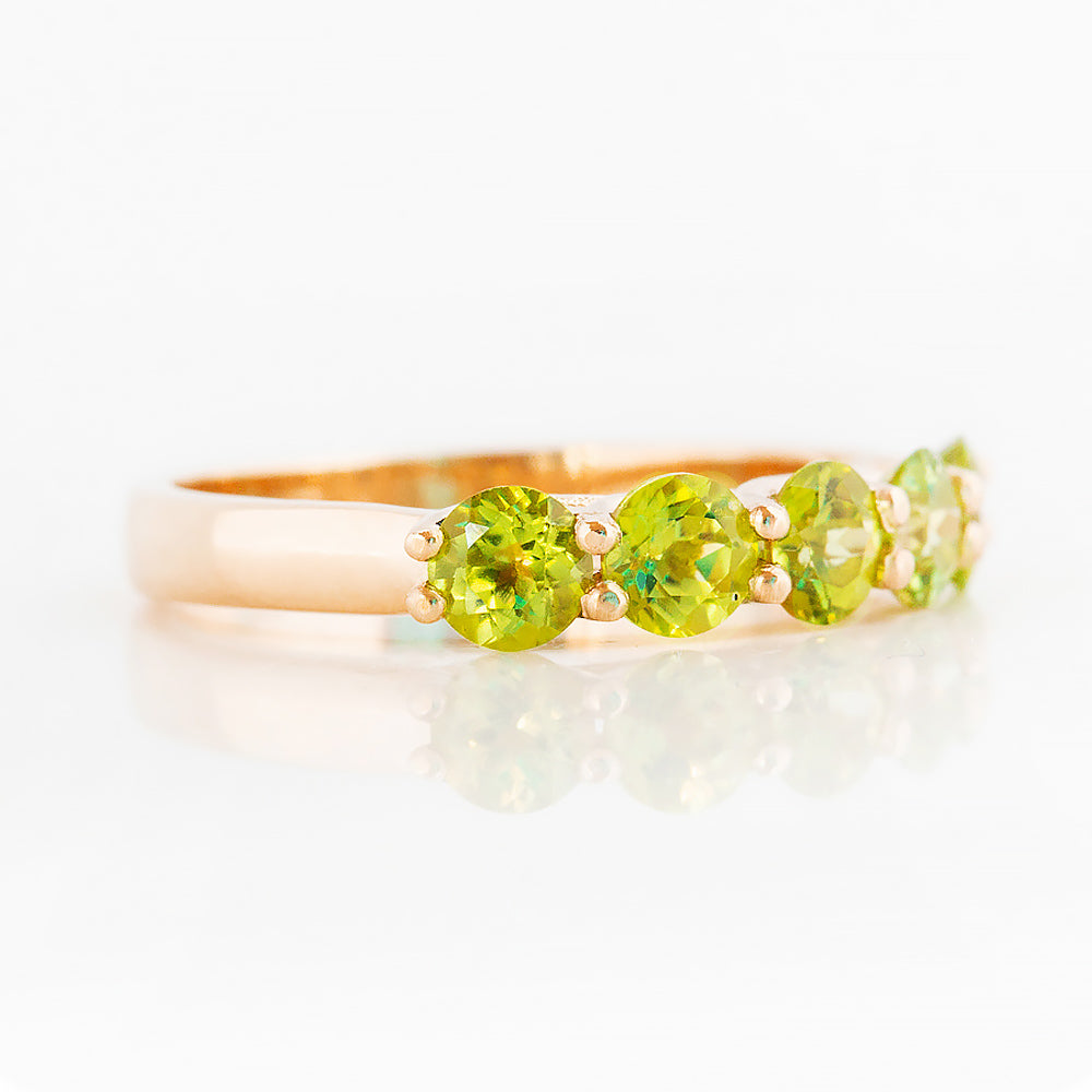 Danelle, a Peridot Half Eternity Trellis Ring