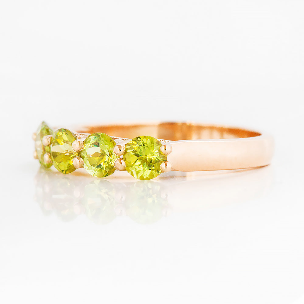Danelle, a Peridot Half Eternity Trellis Ring