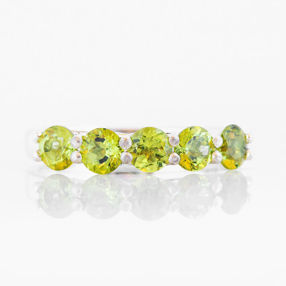 Danelle, a Peridot Half Eternity Trellis Ring