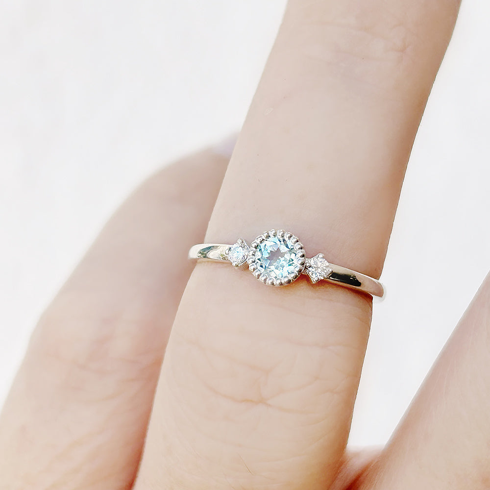 Round cut Sky Blue Topaz and Diamond Trilogy Promise Ring - Victoria's Jewellery
