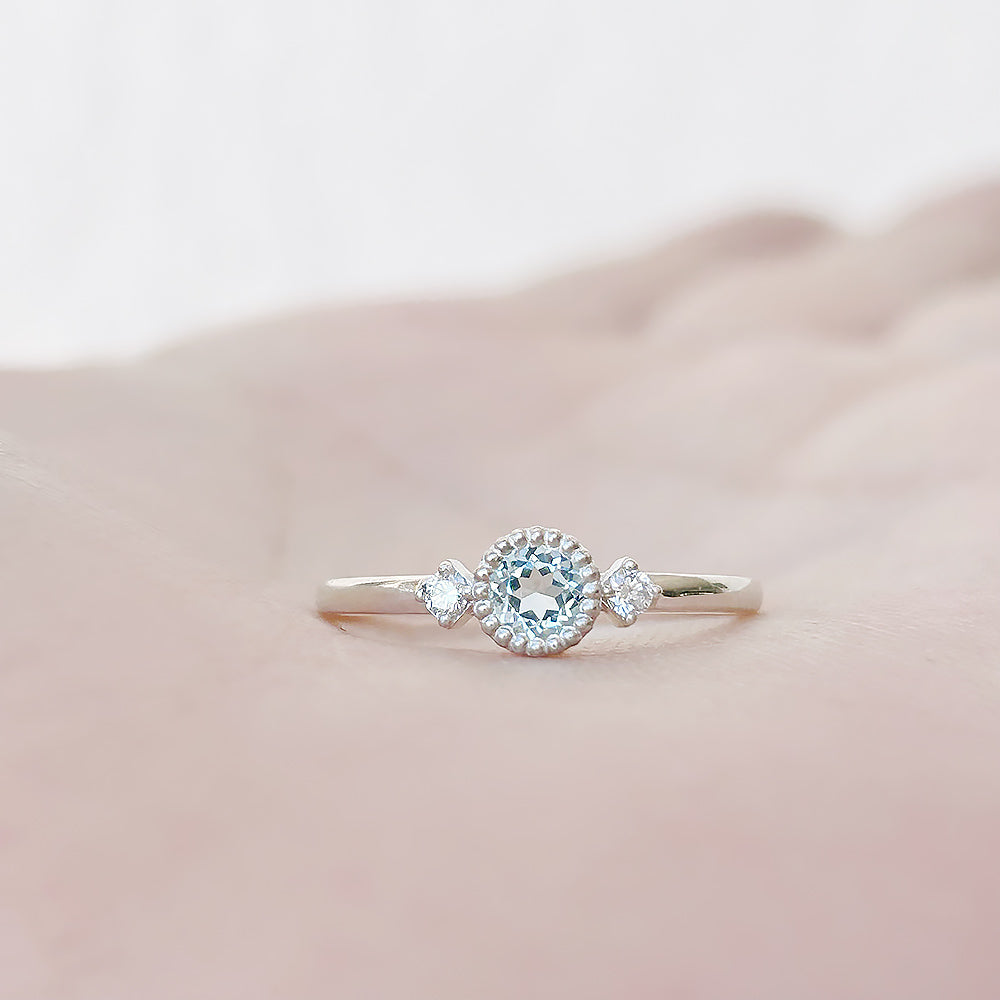 Round cut Sky Blue Topaz and Diamond Trilogy Promise Ring - Victoria's Jewellery