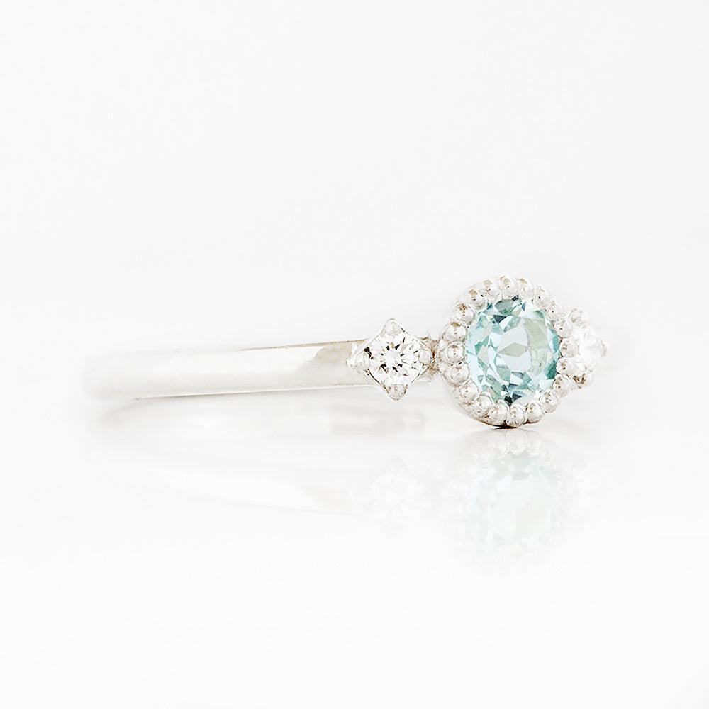 Round cut Sky Blue Topaz and Diamond Trilogy Promise Ring - Victoria's Jewellery