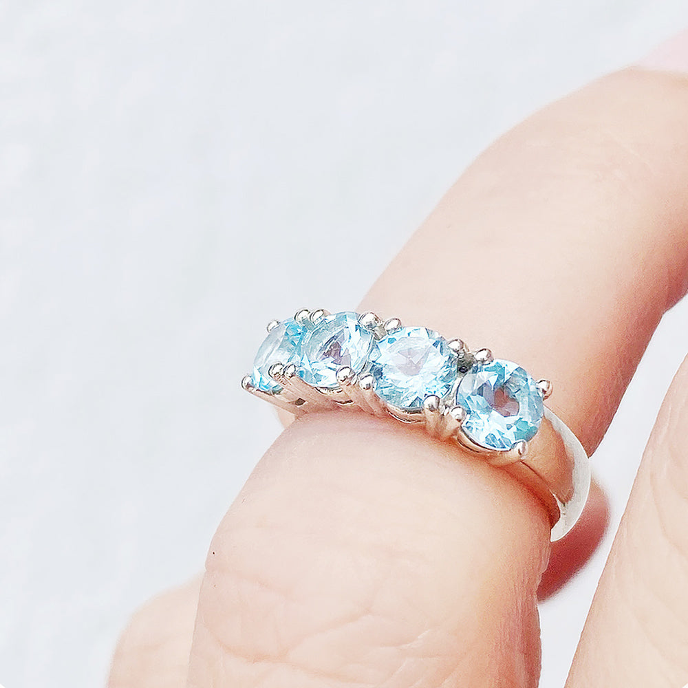 Sky Blue Topaz Half Eternity Ring in White Gold - Victoria's Jewellery