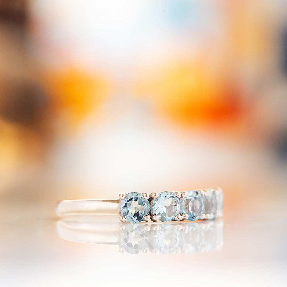 Annie, a Sky Blue Topaz Half Eternity Ring - Victoria's Jewellery
