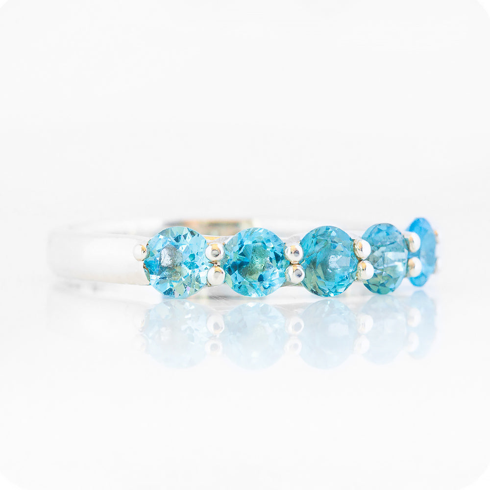 Danelle, a Swiss Blue Topaz Half Eternity Trellis Ring