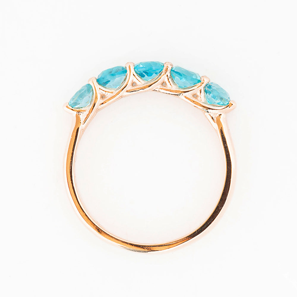 Danelle, a Swiss Blue Topaz Half Eternity Trellis Ring