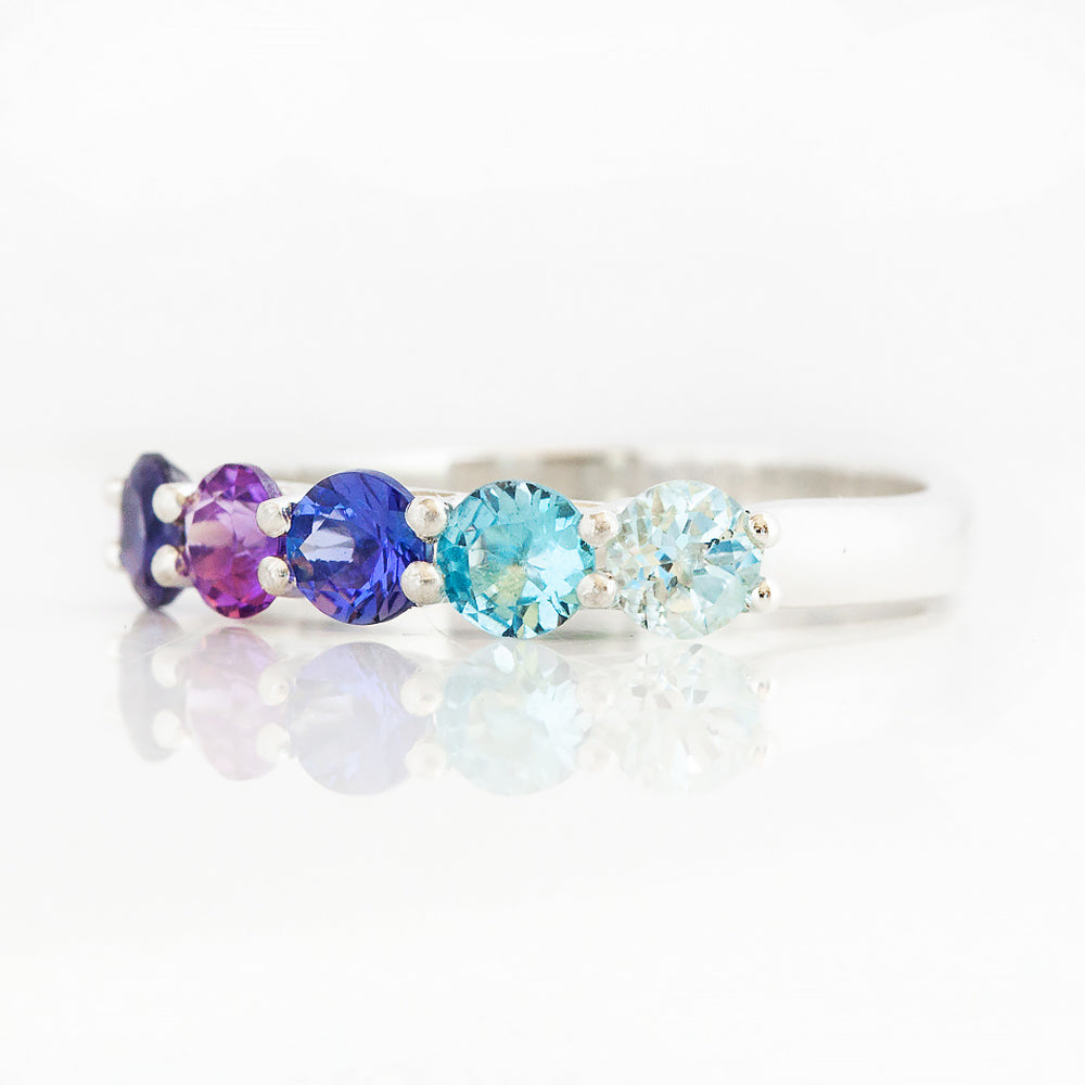 Danelle, a Blue Half Eternity Trellis Ring