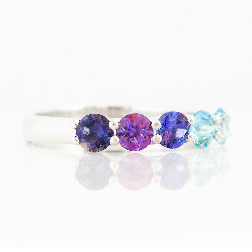 Danelle, a Blue Half Eternity Trellis Ring