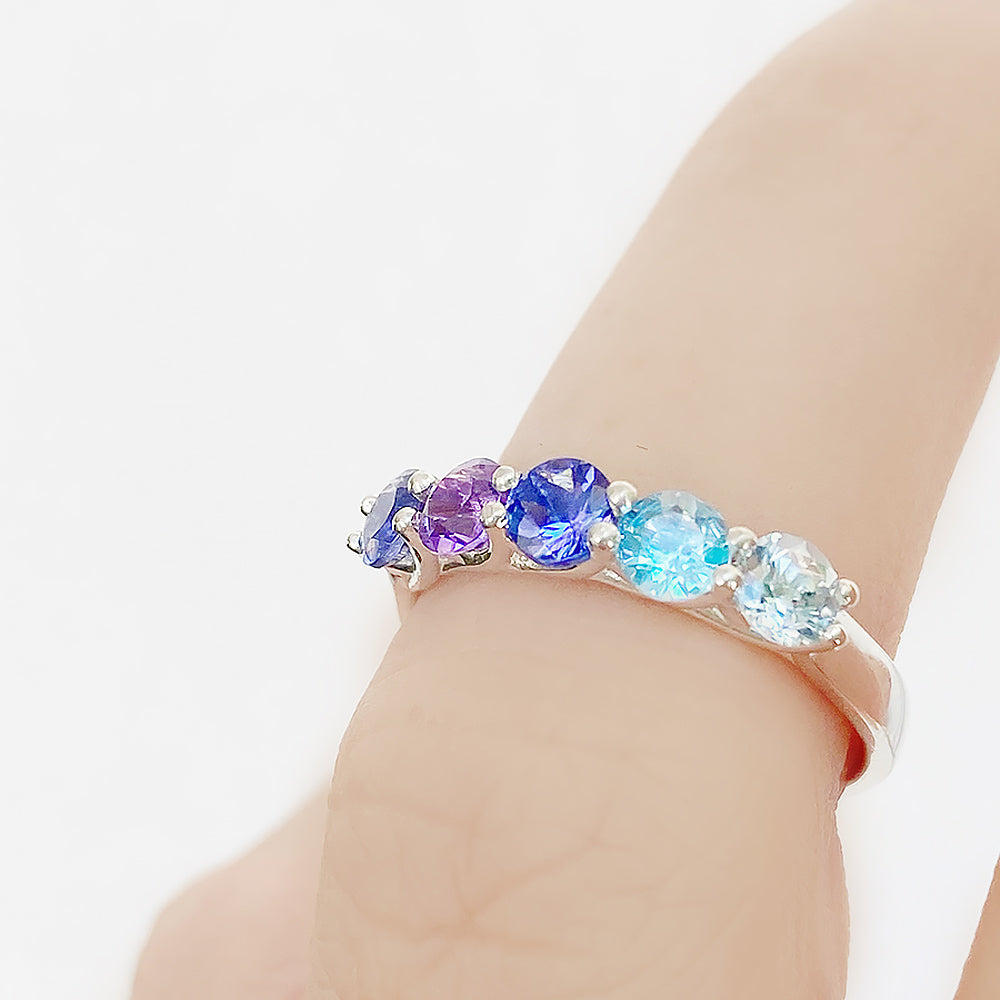 Danelle, a Blue Half Eternity Trellis Ring
