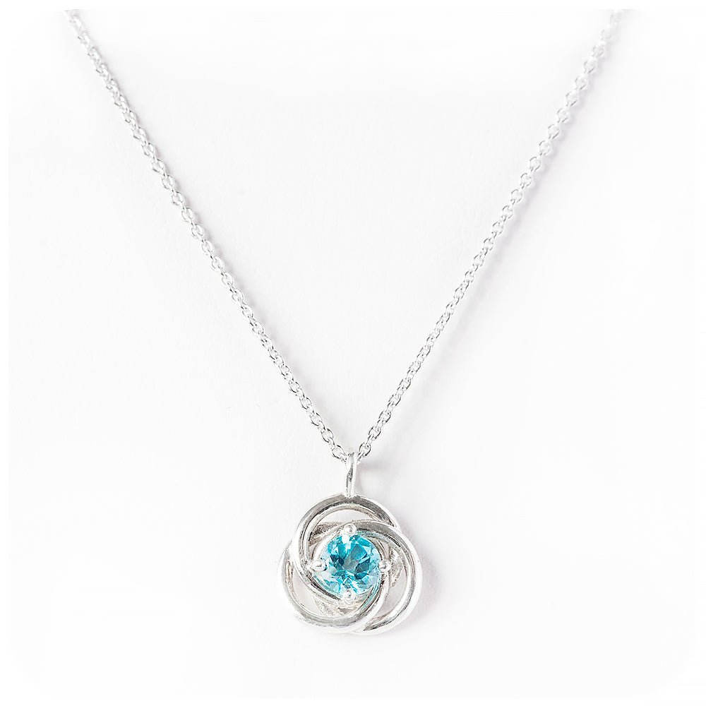 Freyja, a round cut Swiss Blue Topaz Pendant