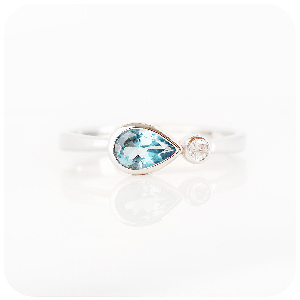 pear cut sky blue topaz and cubic zirconia stack ring in silver