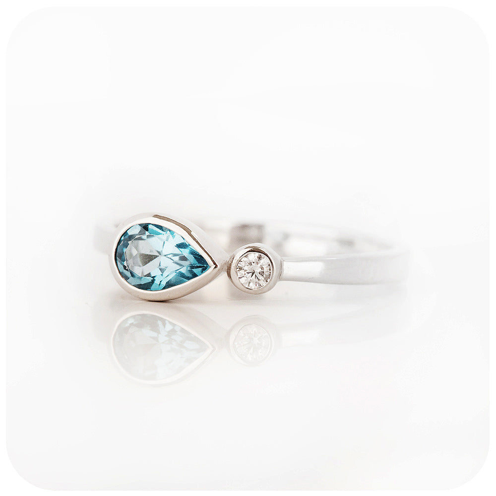 pear cut sky blue topaz and cubic zirconia stack ring in silver