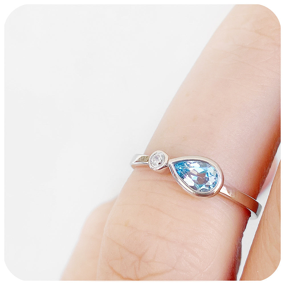 pear cut sky blue topaz and cubic zirconia stack ring in silver