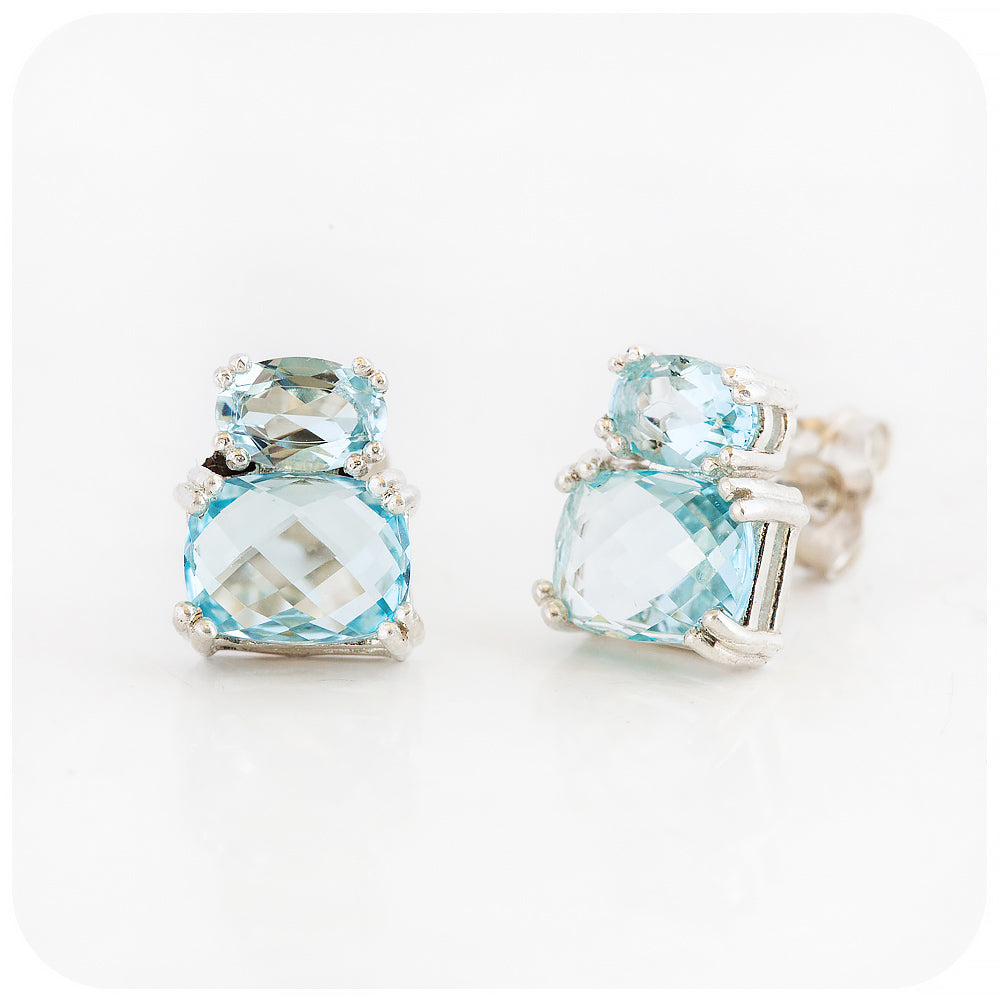 sky blue topaz stud earrings in sterling silver